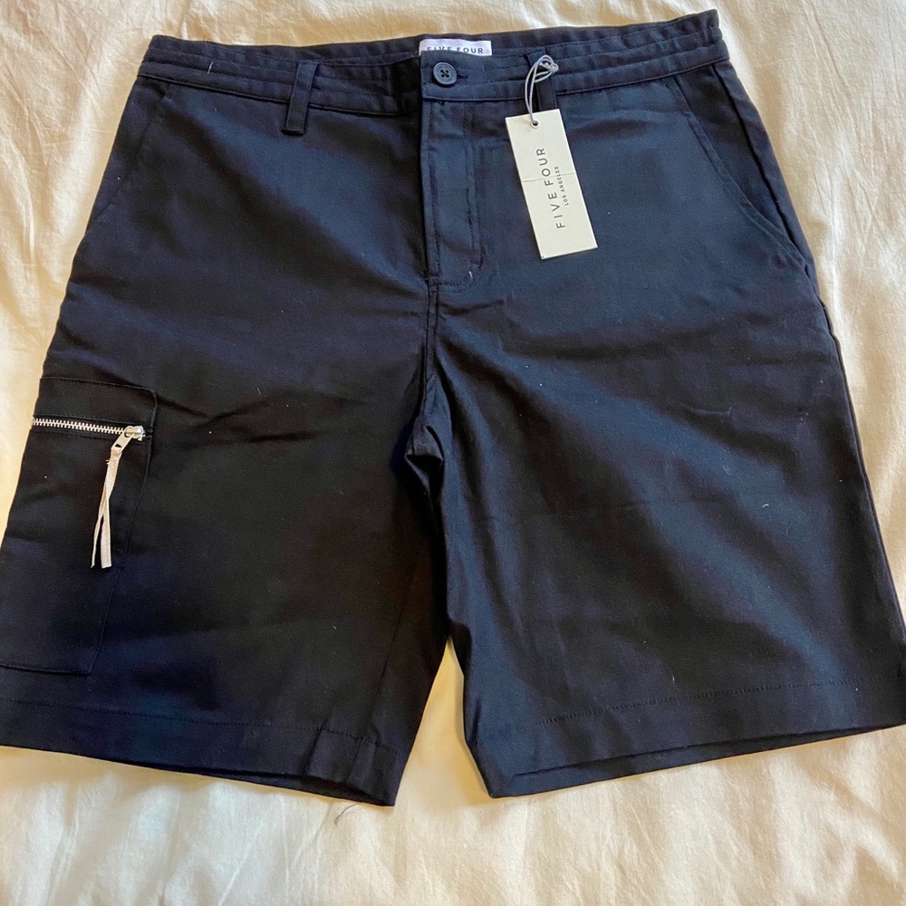Men’s black shorts. Five four.